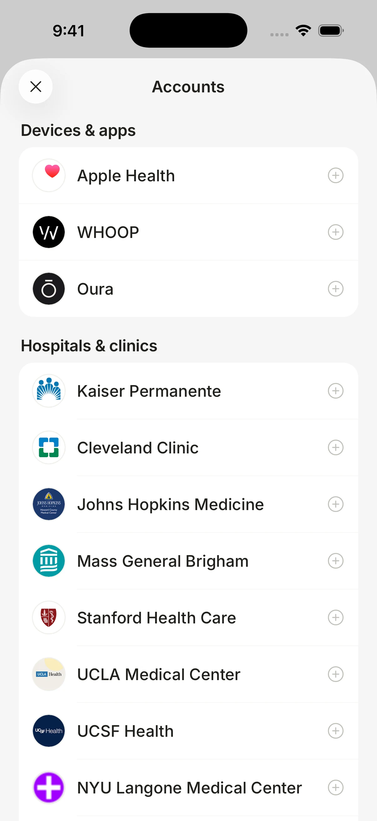The Accounts screen. Apple Health, WHOOP and Oura under Devices and apps, and a list of hospitals under Hospitals and clinics.